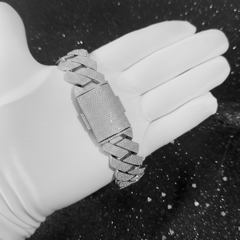 Close-up of a diamond-encrusted chain necklace on a dark background